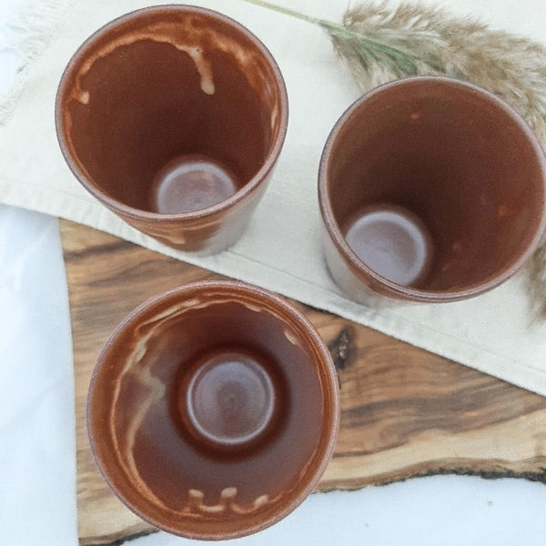 brown ceramic cup, handmade pottery
