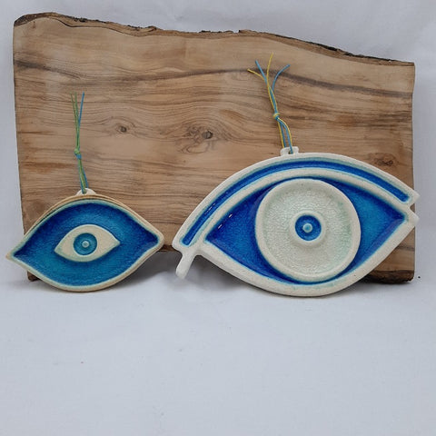 handmade ceramic eye sign