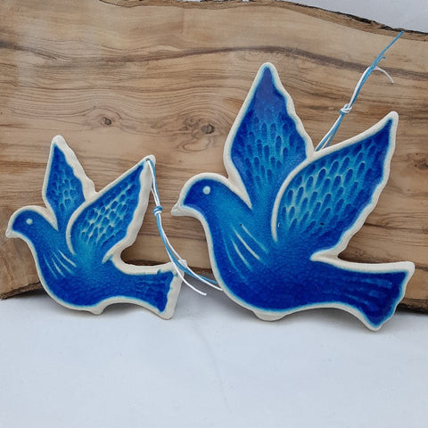 handmade ceramic bird sign