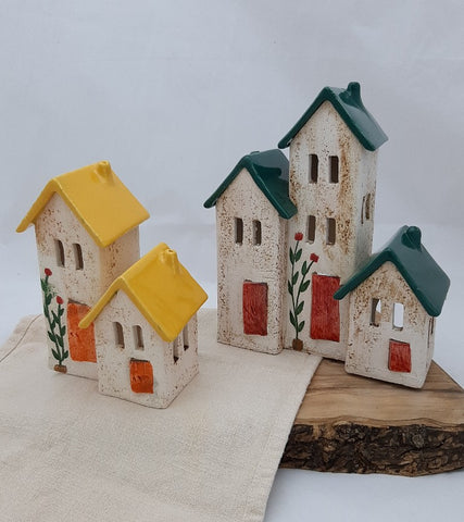 handmade ceramic complex of houses, tea light holder